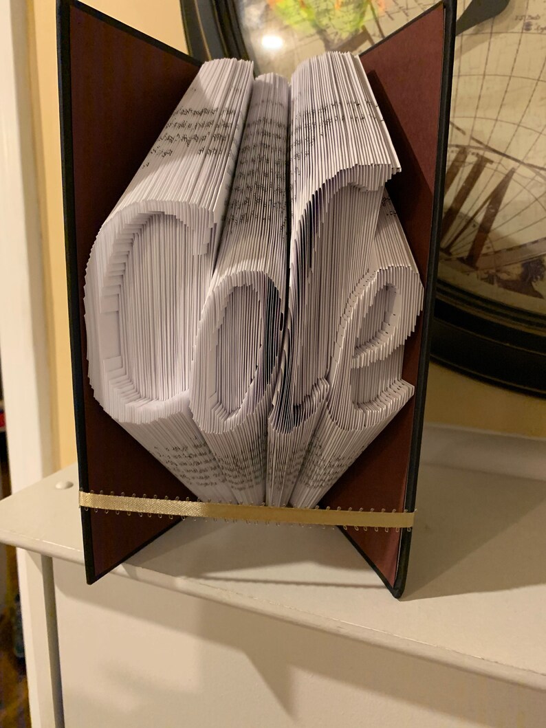 Combination cut and fold style Personalized folded book art