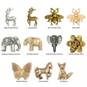 May include: Assortment of decorative metal animal and insect figurines in various finishes, including antique silver, brass, antique gold, and chrome. The figurines include a stag, bee, elephant, butterfly, horse, and cat.