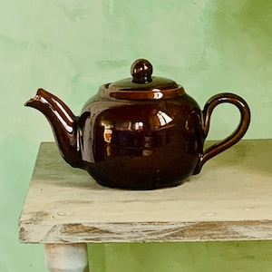 Terracotta teapot beautiful antique teapot in brown glazed terracotta