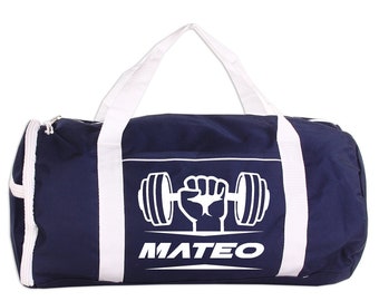May include: A navy blue duffel bag with white straps and a white graphic of a hand lifting a dumbbell. The text "MATEO" is printed below the graphic.