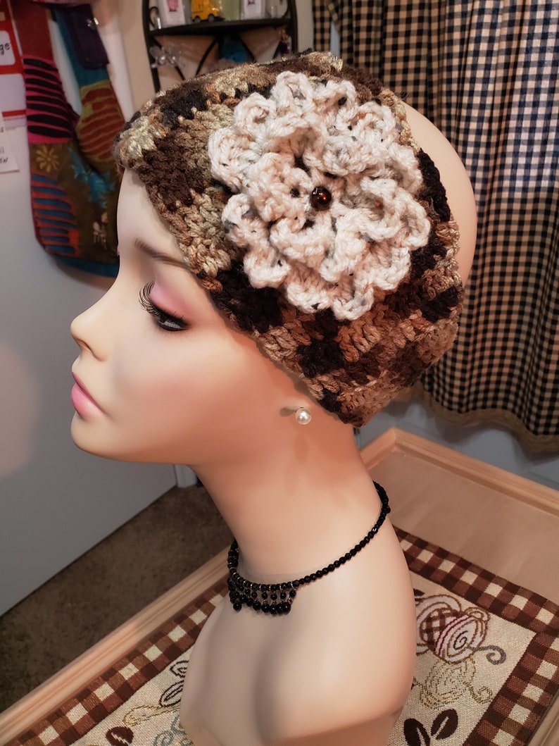Ear warmer detachable flower adjustable Winter Spring or fall.