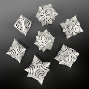 May include: Set of seven white dice with a swirling pattern and numbers on each face. The dice are arranged in a circle on a gray background.