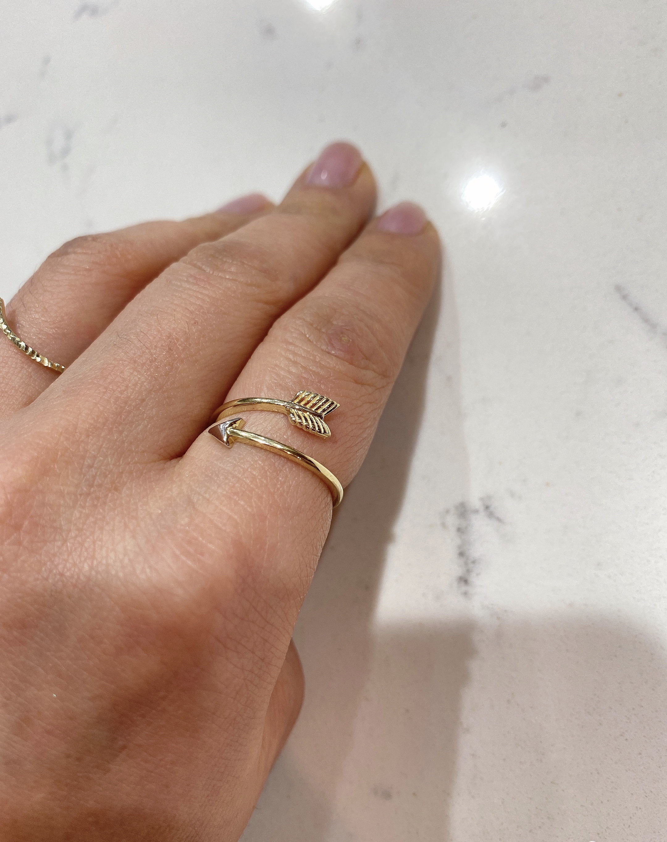 Ring with deals arrow