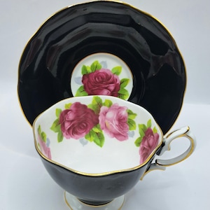 Royal albert black cup and saucer pink roses ,vintage bone china made in England