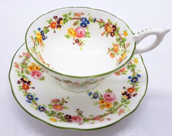 Tasse à thé et soucoupe Coalport, guirlande florale, porcelaine tendre, fabriqués en Angleterre