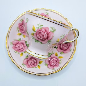 Paragon teacup and saucer with cabbage rose , pink with garland of pink roses , vintage bone china made in England