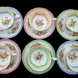 Royal Albert prudence set of 6 demitasse teacups and saucers , pink , blue , green, florals , gold trim , English Teaparty bone china