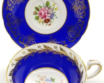 Mismatched blue Paragon teacup and saucer- made in England.