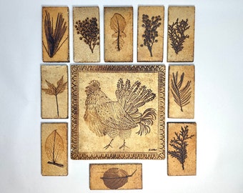 Vintage 1970s midcentury Modernist French ceramic tiles by Roger Capron with pressed leaves and etched rooster