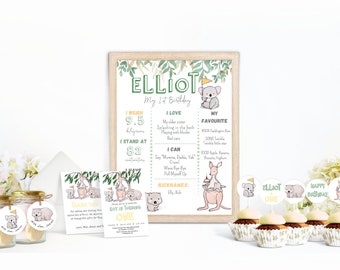 May include: A printable first birthday party sign for a boy named Elliot. The sign features a koala, kangaroo, and eucalyptus leaves. It includes details about Elliot's weight, height, favorite things, and abilities. The sign is in a green and yellow color scheme.