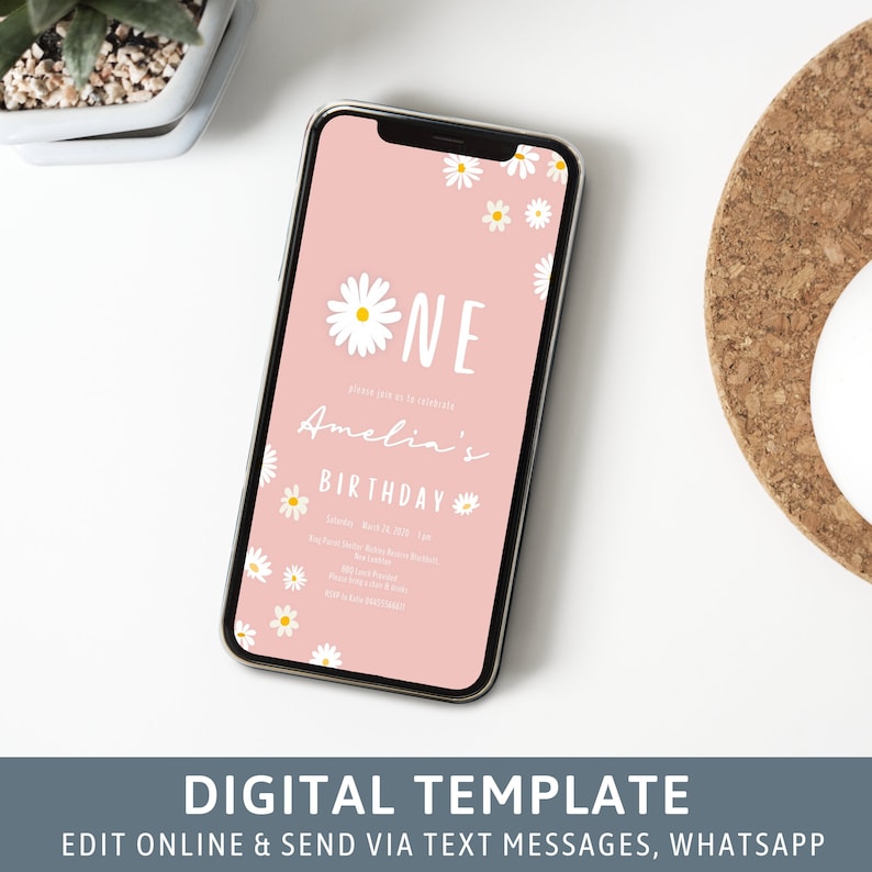 May include: A pink digital invitation with white daisies and the text "One Amelia's Birthday" on a smartphone screen. The invitation includes the date, time, and location of the event.