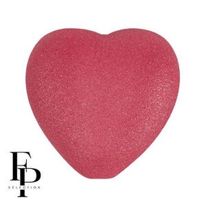 May include: A heart-shaped object in a vibrant shade of red. The surface has a textured, speckled appearance. The logo "FD Selection" is in the lower left corner.