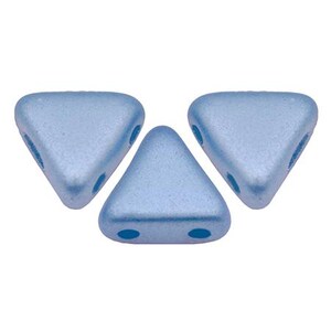May include: Three light blue triangle-shaped beads with two holes each.
