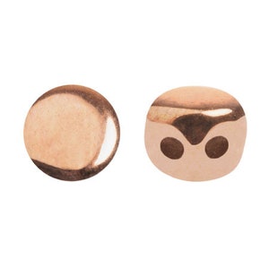 May include: Two rose gold metal beads, one with a smooth round surface and the other with two holes.