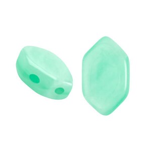 May include: Two light green glass beads with holes for stringing. The beads are shaped like a teardrop and a hexagon.