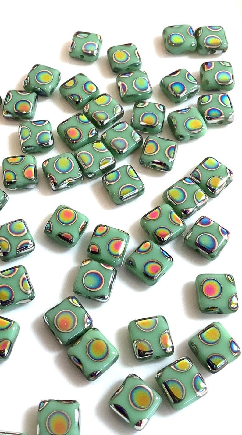 Preciosa Peacock Tile beads 6mm - Green, 20 pcs, 1 hole, Flat Square, Czech Pressed Glass Beads
Preciosa Smooth Thin Flat Square Tile, Peacock pattern, 1-hole beads.
Ideal for jewelry making or crafting, beading, bracelet making.