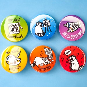 Botones de mapache de artista: botón con pinback de 1,5" (38 mm), reverso de plástico