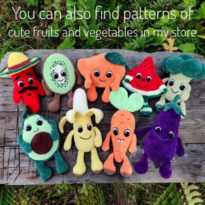 May include: A collection of crocheted fruit and vegetable plushies. The plushies are all different colors and have cute faces. They are arranged on a wooden surface.