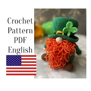 May include: Crochet pattern PDF in English for a green leprechaun gnome with an orange beard and a green hat with a shamrock.