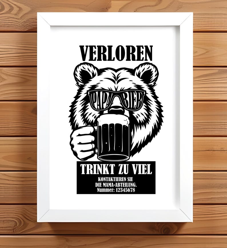 May include: Framed black and white print. It features a bear wearing sunglasses with the words "Papa Bier" and holding a beer stein. The text above the bear reads "VERLOREN" and below reads "TRINKT ZU VIEL".