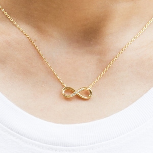 Gold Plated Infinity Pendant Necklace Created with Zircondia® Crystals by Philip Jones