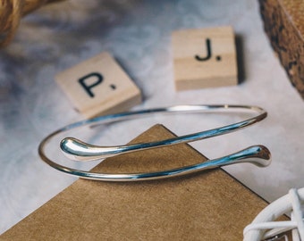 Silver Plated Teardrop Bangle by Philip Jones