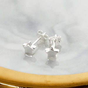Sterling Silver Star Earrings (Pair) by Philip Jones