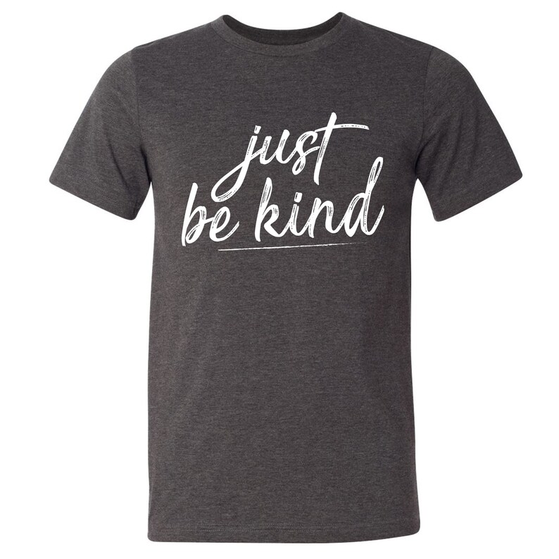 May include: A dark heather grey t-shirt with the text "just be kind" in white lettering.