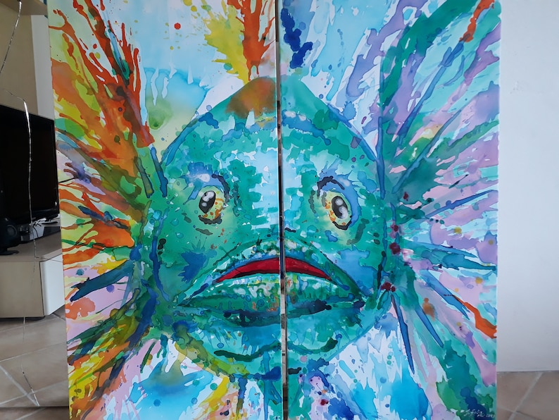 May include: A vibrant watercolour painting of a fish with a surprised expression. The artwork features a teal body, red mouth, and expressive eyes. Splashes of orange, yellow, and blue surround the fish, creating a dynamic and colourful composition.