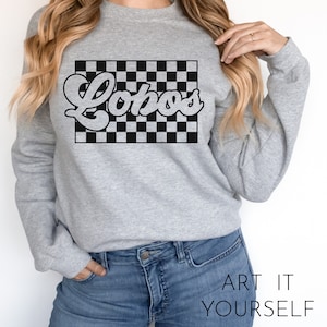 May include: Gray sweatshirt with a black and white checkered design and the word "Lobos" in a retro font.