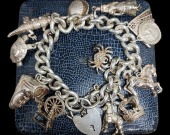 Beautiful Vintage 1976 Hallmarked Unique Multi Charm Design Collectable Travel Heavy 95 Gram Sterling Silver Charm Bracelet - lgth 6.5"