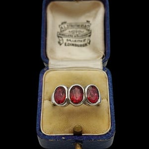 Beautiful Vintage Skillfully Crafted Decorative Sparkling Trilogy Oval Cut Lab Red Ruby Gemstone Sterling Silver Ring - size V1/2