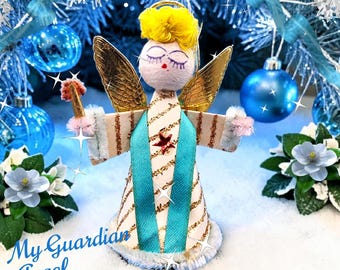 Angelo ornamentale vintage in cotone filato anni '50 Giappone Ali in lamina d'oro Glitter in mica Aureola in ciniglia Nastro blu Stella Natale