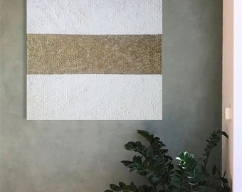 May include: Abstract painting with a textured white background and a horizontal band of gold paint.