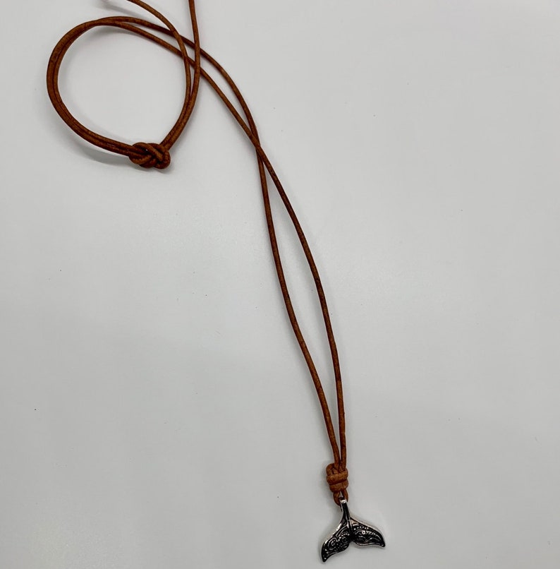 Antique silver finish whale charm on leather