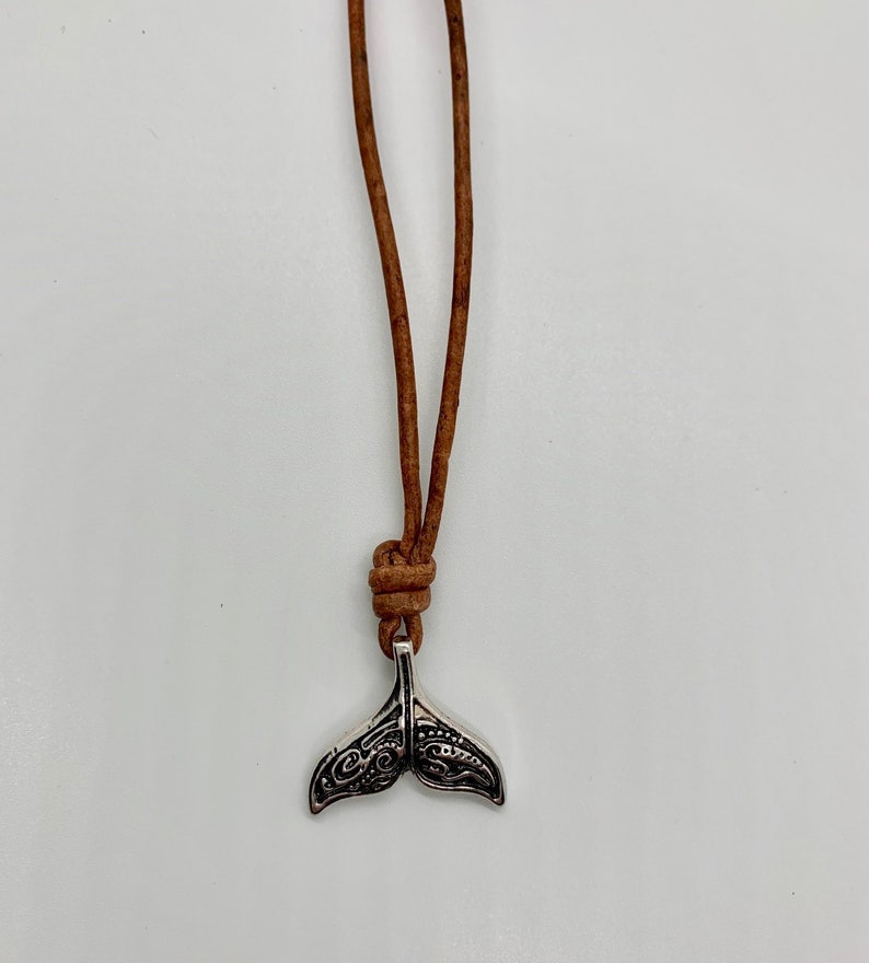Antique silver finish whale charm on leather