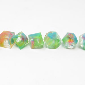 One of kind, Retro-Act-Ive , UV  Reactive, SHARP Polyhedral Dice Set