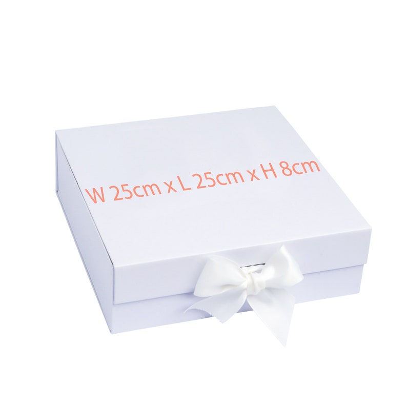 May include: A white gift box with a white satin ribbon bow. The box measures 25cm wide by 25cm long by 8cm high.