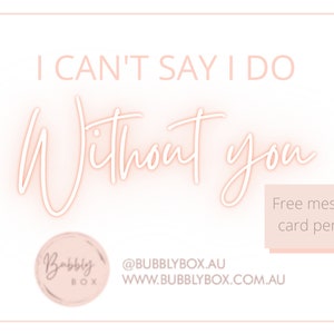May include: A pink and white card with the text "I can't say I do without you."  The card also includes the text "Free message card per box" and the logo for "Bubbly Box" with the text "@bubblybox.au www.bubblybox.com.au".