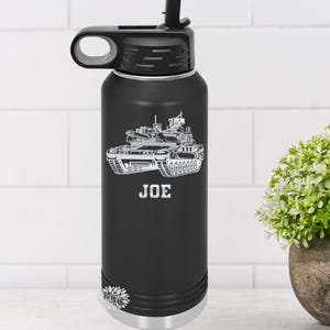 May include: Black stainless steel water bottle with a white tank graphic and the name "JOE" engraved on the side.