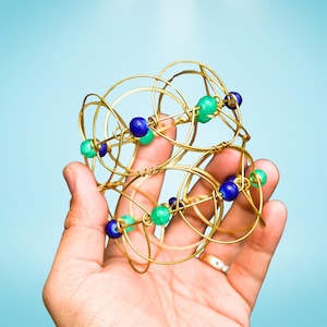 Inspired Revival of This Classic Treasure - Wire Ring for Work & Busy Hands - Action Fidget Toy - Lotus Bloom Transforming Flower Mandala