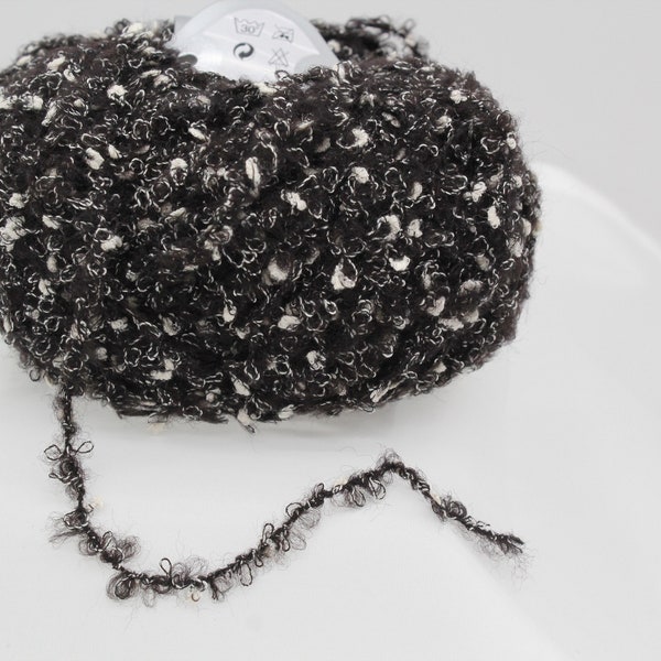 109 yards of boucle alpaca blend yarn with unique texture, grey and black with white specs