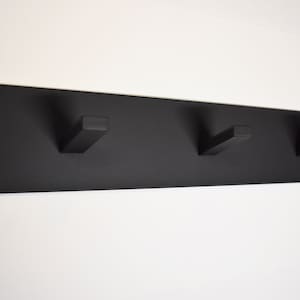 Modern handcrafted wall mount steel coat rack- Satin black steel minimalist wall mounted coat rack. Mudroom, entryway, laundry room.