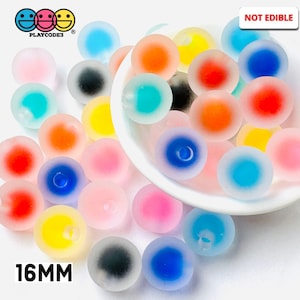 May include: A collection of 16mm translucent round beads in various colors, including pink, blue, yellow, red, and black. The beads are arranged in a bowl and on a white surface. "NOT EDIBLE" and "PLAYCODES" are printed on the image.