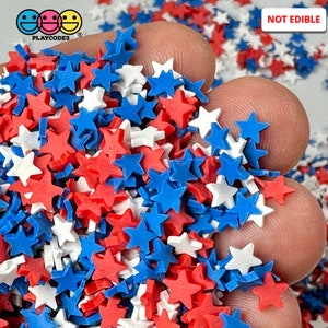 May include: Red, white, and blue star-shaped sprinkles. Not edible.