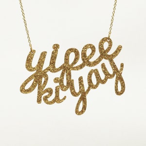 Yipee Ki Yay Necklace: Gold Glitter Acrylic Christmas Party Statement