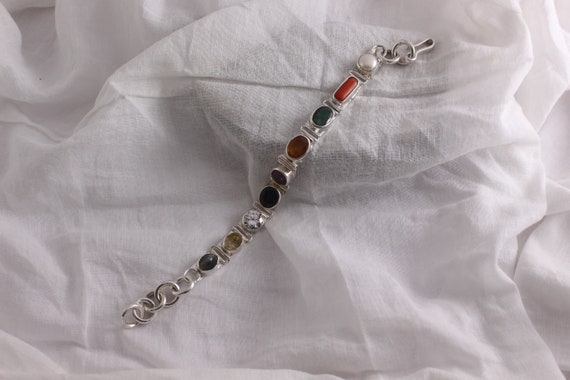 Silver navratna best sale bracelet