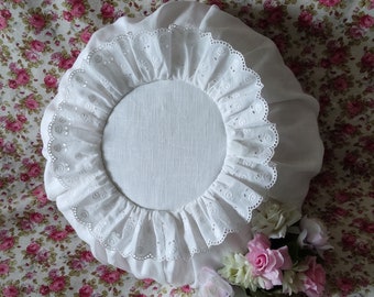 Cushion with removable white linen English embroidery cover