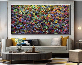 May include: Abstract painting with a colorful, textured, and layered design. The painting features a variety of colors, including blue, green, yellow, red, and purple. The painting is framed and hanging on a wall.
