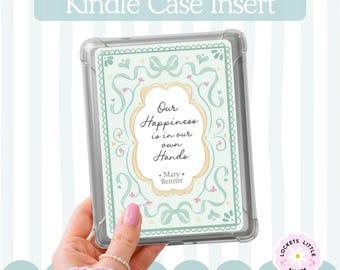 May include: A clear Kindle case containing a decorative insert with a light green background, a yellow scalloped frame, and the text Our Happiness is in our own Hands Mary Bennet, surrounded by light green ribbons and small pink floral accents.
